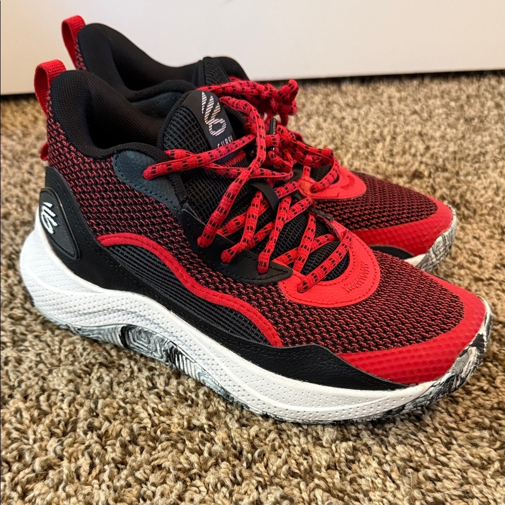 Kids Steph Curry’s Red and Black Athletic Shoes